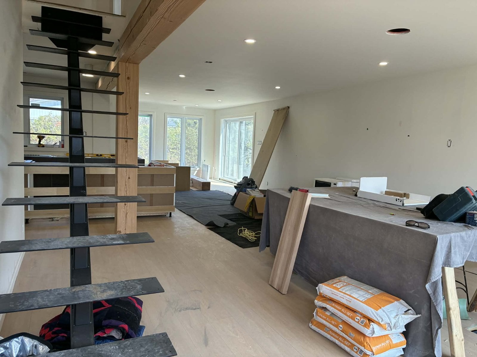 During the work: steel-stringer staircase before the wood treads are installed